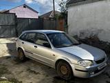 Mazda 323 1999 года за 800 000 тг. в Атырау – фото 2