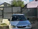 Mazda 323 1999 года за 800 000 тг. в Атырау – фото 5