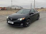 Toyota Camry 2014 года за 9 000 000 тг. в Жанаозен