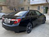 Toyota Camry 2014 года за 9 000 000 тг. в Жанаозен – фото 5