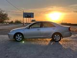 Toyota Camry 2004 года за 5 500 000 тг. в Байконыр – фото 4