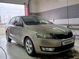 Skoda Rapid 2013 года за 4 600 000 тг. в Атырау – фото 2