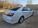 Toyota Camry 2014 года за 11 500 000 тг. в Жанаозен – фото 2