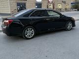 Toyota Camry 2014 года за 5 200 000 тг. в Жанаозен – фото 3