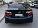 Toyota Camry 2014 года за 5 200 000 тг. в Жанаозен – фото 4