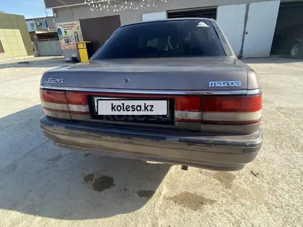 Mazda 626 1991 года за 600 000 тг. в Жанаозен – фото 4