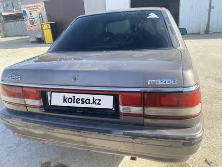 Mazda 626 1991 года за 600 000 тг. в Жанаозен – фото 5