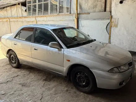 Mitsubishi Carisma 1997 года за 900 000 тг. в Алматы – фото 2