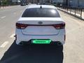 Kia Rio 2021 года за 7 500 000 тг. в Атырау – фото 13