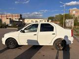 Renault Logan 2014 года за 2 290 000 тг. в Караганда – фото 4