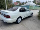 Toyota Carina E 1995 года за 1 050 000 тг. в Алматы – фото 2