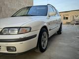 Mazda 626 1999 года за 2 400 000 тг. в Жанаозен – фото 4