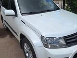 Suzuki Grand Vitara 2013 года за 7 500 000 тг. в Караганда – фото 2