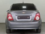 Chevrolet Aveo 2013 года за 4 100 000 тг. в Шымкент – фото 4