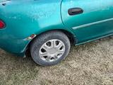 Mazda 323 1994 годаүшін700 000 тг. в Отеген-Батыр – фото 3