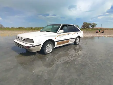 Nissan Bluebird 1988 года за 400 000 тг. в Приозерск – фото 4