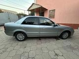 Mazda 323 2000 года за 2 000 000 тг. в Алматы – фото 2