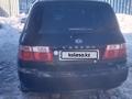 Kia Carens 2003 года за 1 800 000 тг. в Актобе – фото 2