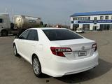 Toyota Camry 2014 года за 5 400 000 тг. в Уральск – фото 5