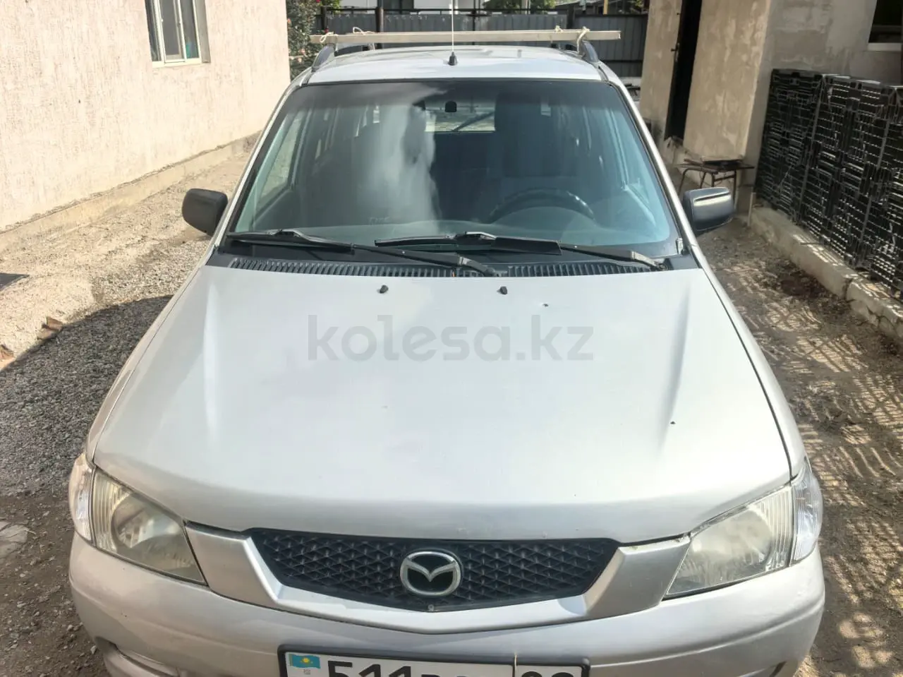 Mazda Demio, 2002