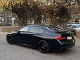 BMW 750 2015 года за 26 000 000 тг. в Алматы – фото 2