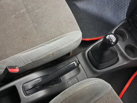 Mazda Familia 1997 года за 850 000 тг. в Астана – фото 11