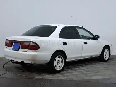 Mazda Familia 1997 года за 850 000 тг. в Астана – фото 5