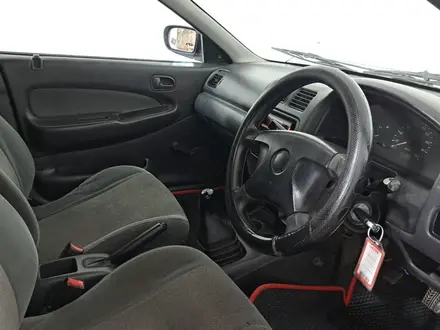 Mazda Familia 1997 года за 850 000 тг. в Астана – фото 18