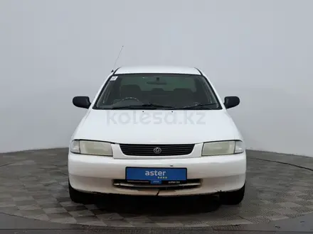 Mazda Familia 1997 года за 850 000 тг. в Астана – фото 2