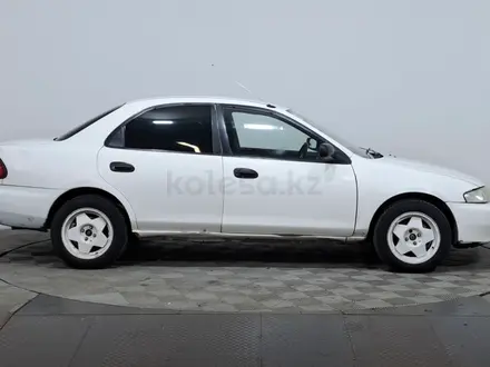 Mazda Familia 1997 года за 850 000 тг. в Астана – фото 4