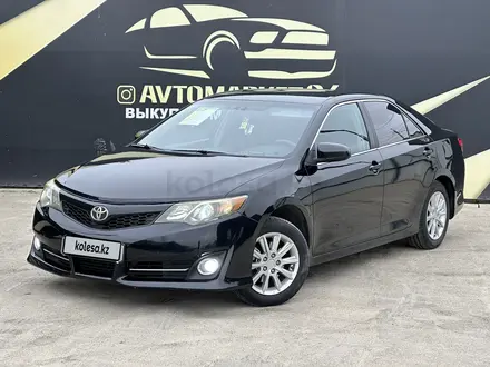 Toyota Camry 2014 года за 8 200 000 тг. в Атырау