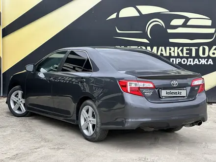 Toyota Camry 2012 года за 8 850 000 тг. в Атырау – фото 4