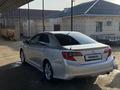 Toyota Camry 2014 года за 7 400 000 тг. в Жанаозен – фото 10