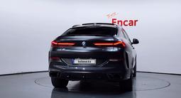 BMW X6 XDrive 40i 2023 года за 41 000 000 тг. в Алматы – фото 4