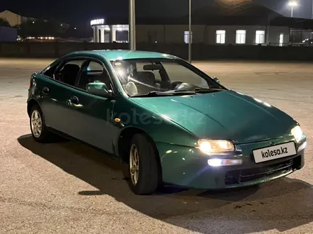 Mazda 323 1994 года за 1 100 000 тг. в Талдыкорган – фото 2