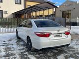 Toyota Camry 2015 года за 6 400 000 тг. в Кульсары – фото 4