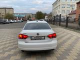 Volkswagen Passat 2014 года за 8 000 000 тг. в Актобе – фото 4