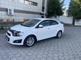 Chevrolet Aveo 2013 года за 3 800 000 тг. в Караганда – фото 2