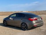 Kia Cerato 2013 года за 6 700 000 тг. в Атырау – фото 2