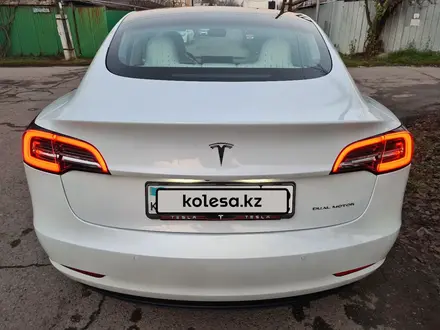 Tesla Model 3 2021 года за 18 850 000 тг. в Алматы – фото 24