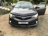 Toyota Camry 2014 года за 7 500 000 тг. в Актобе