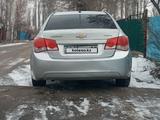 Chevrolet Cruze 2011 года за 2 900 000 тг. в Алматы – фото 2