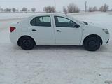 Renault Logan 2015 года за 3 500 000 тг. в Уральск – фото 2
