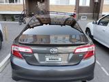 Toyota Camry 2013 года за 6 200 000 тг. в Уральск – фото 2