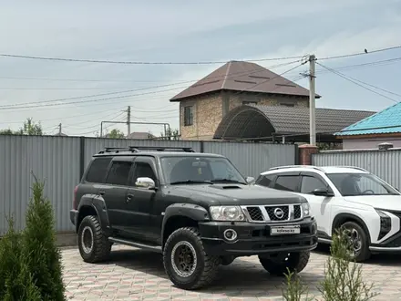 Nissan Patrol 2008 года за 11 000 000 тг. в Алматы – фото 12