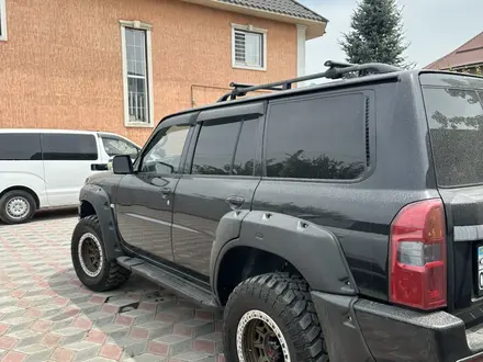 Nissan Patrol 2008 года за 11 000 000 тг. в Алматы – фото 6