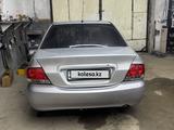 Mitsubishi Lancer 2003 года за 2 000 000 тг. в Жезказган