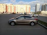 Hyundai Elantra 2013 года за 6 700 000 тг. в Астана – фото 2