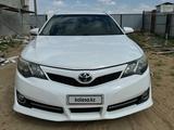 Toyota Camry 2014 года за 5 700 000 тг. в Кульсары