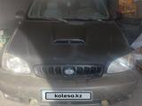 Kia Carnival 2001 года за 1 200 000 тг. в Шымкент